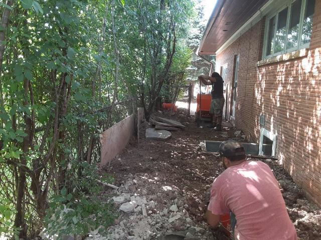 Cleaning up from excavating and egress window install.