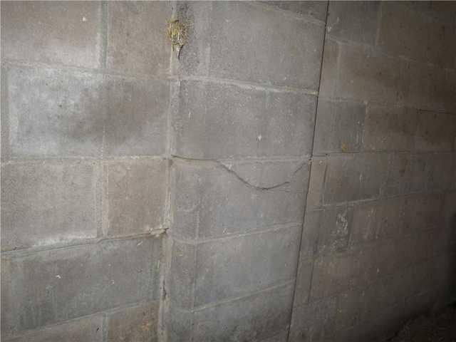 This photo shows cracks in the foundation walls in this Fall Creek, WI home.