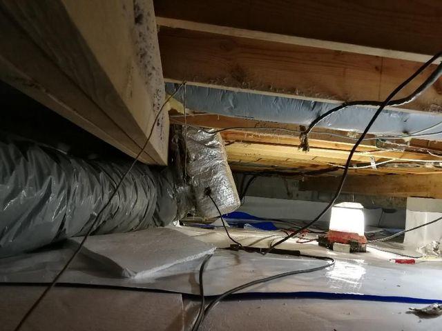 Working in a small, messy crawl space