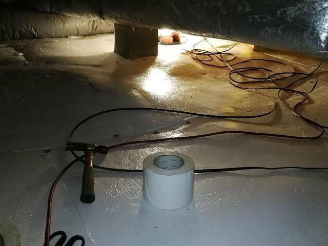 Working in a small, messy crawl space