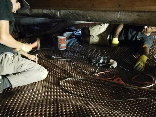 Working in a small, messy crawl space