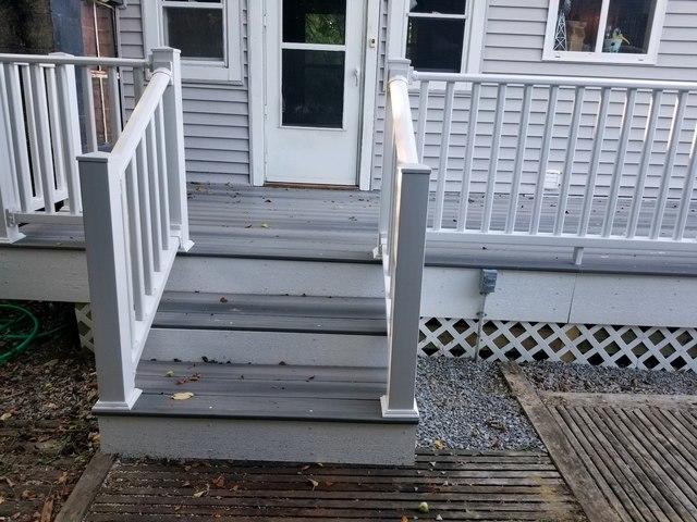 Front steps installed on a patio.