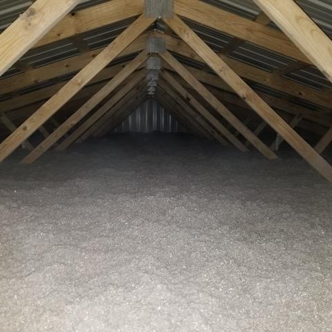 Our team blew in cellulose insulation to insulate the attic.