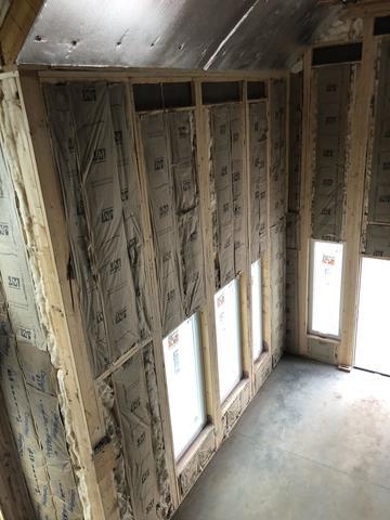 <p>We insulated the walls with batt insulation.</p>