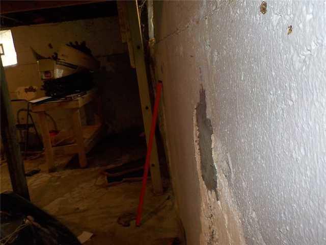 You can tell in this picture that the wall is bowing which is not something you want to see in your home. Bowing could have resulted from the home settling and could get worse if not fixed so give us a call if you have this happening.