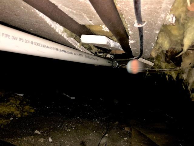 How the floor joists looked before we insulated them.