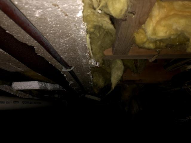 How the floor joists looked before we insulated them.