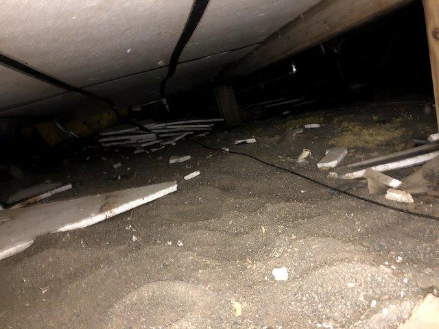 How the crawl space and the sheet rock looked before we encapsulated and insulated it.