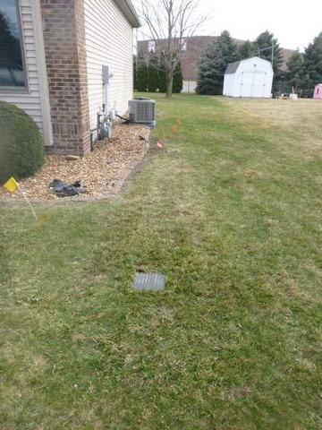 Final installation of Underground Downspout Discharge.