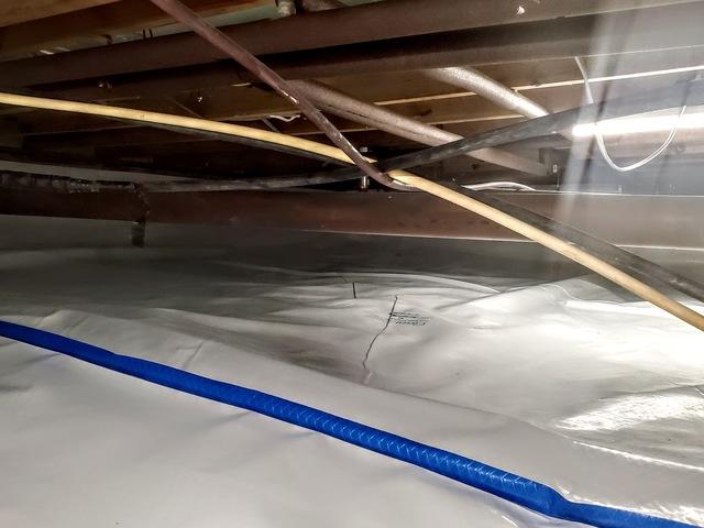 Here we can see the seam of where two pieces of CleanSpace turned into one in the first area of the crawl space.