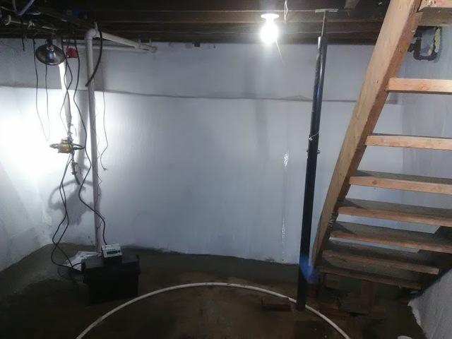 An interior drainage system was installed in the basement, along with the area being waterproofed.