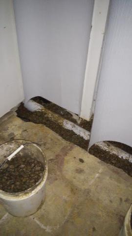 The drainage system was installed under the floor of the basement.