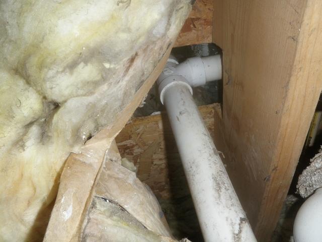 Crawlspace Plumbing Penetration Allows Air to Enter This Dover, Delaware Bathroom