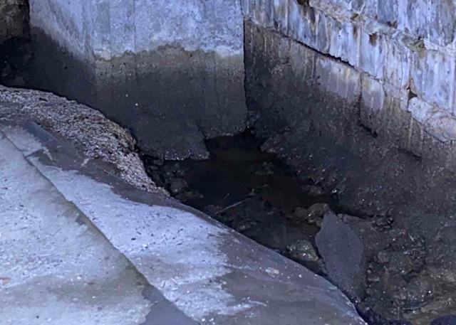 During the inspection by Southeast Foundation & Crawl Space Repair, Andy the inspector found signs of standing water against the foundation wall.