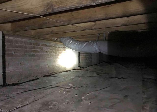 Parts of the crawl space had a thin plastic liner littering the floor however, it still allowed moisture to enter the crawl space.