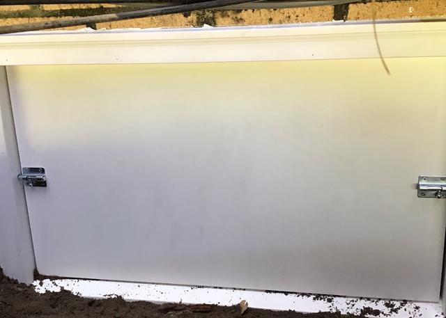 The custom made PVC door installed by Southeast Foundation & Crawl Space Repair is made to last. Made from PVC it will not be affected by the elements that a wood door would have.