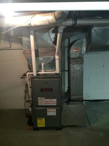 <p>A newly installed, 96% efficient furnace. Vented in PVC pipe, the ductwork has been sealed at the joints, ensuring the air flows where it needs to go.</p>