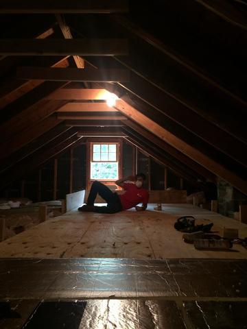 <p>Here is an example of a finished attic platform. First, a sublayer of plywood is put down. Then, 2" foam board is fitted over the plywood, providing an insulating factor of R-15. Finally, a top layer of plywood is attached, allowing for storage space. As part of a complete attic package, the bays along the platform are blocked off, and cellulose insulation is dense-packed underneath.</p>