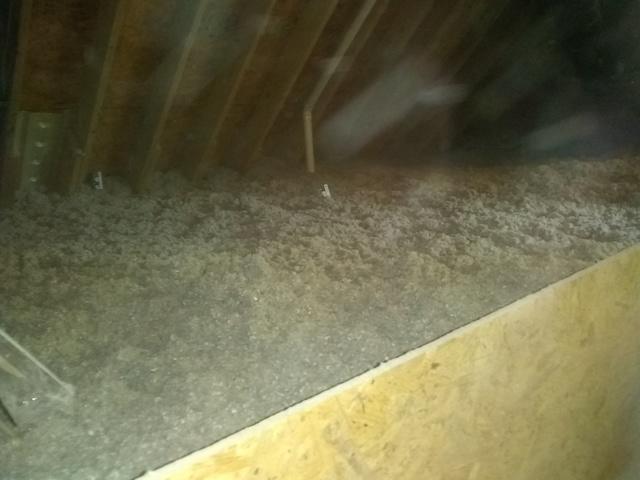 We blew in new cellulose insulation into the air sealed attic space.