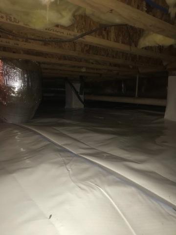 The encapsulation installed protects the crawlspace by keeping out humid outside air and ground moisture, while insulating the outside walls.