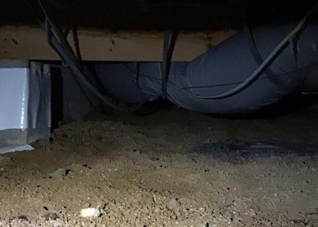 The crawl space of this home in Chapel Hill, NC had moisture issues caused by having a dirt crawl space.