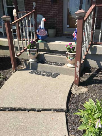 This is what the sidewalk looked like before we installed the PolyLevel and NexusPro.