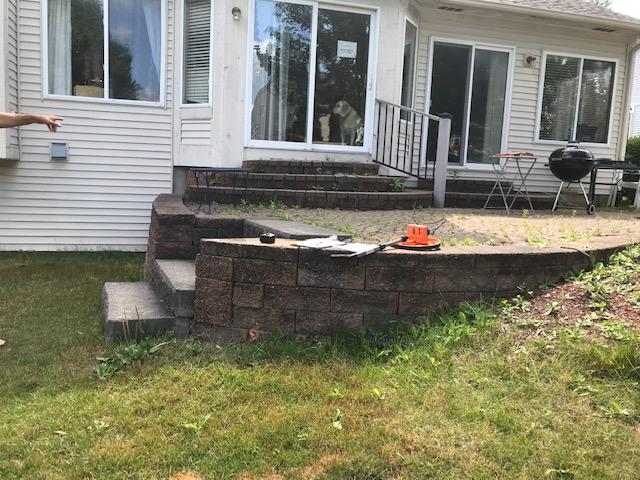 The start of removing the paved patio