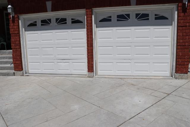 We leveled the driveway and brought it to grade with the garage floor