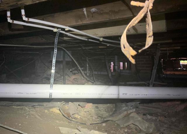 The crawl space of this Roseboro, NC home was completely open. There was no vapor barrier to protect the home from moisture entering the home from the earth's ground.