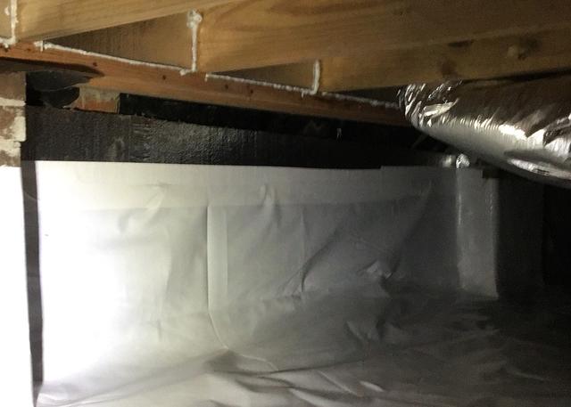 A completed CleanSpace Encapsulation System should make the crawl space nice and bright, providing excellent coverage against water vapor entering the crawl space.