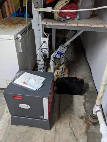 <p>In conjunction with the BrightWall and WaterGuard, our patented TripleSafe Sump Pump System and SaniDry dehumidifer were also installed to ensure no matter what happened, Yvette's basement would always be dry.</p>