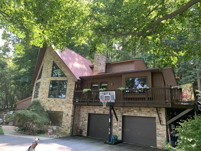 Front View with the new asphalt shingles.