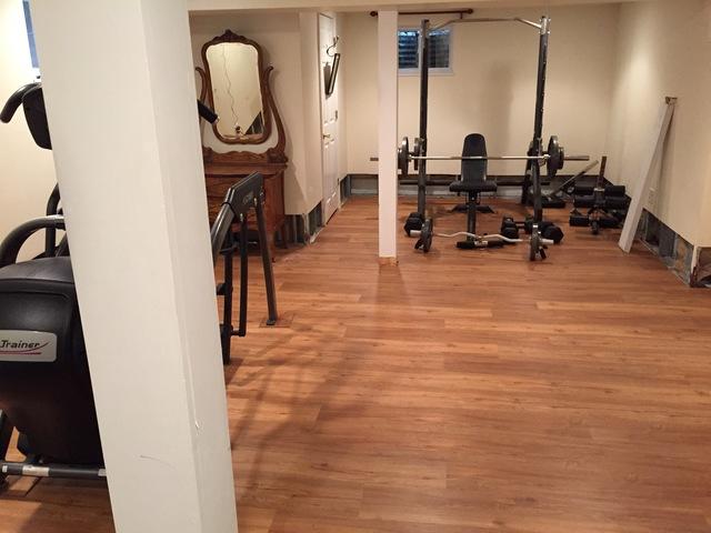 <p>Our team came in and redid the floors for this homeowner's new gym.&nbsp;</p>