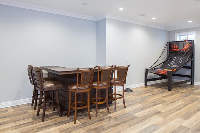 Our team came in and redid the floors for this homeowner's new basement. Here is their bar area.