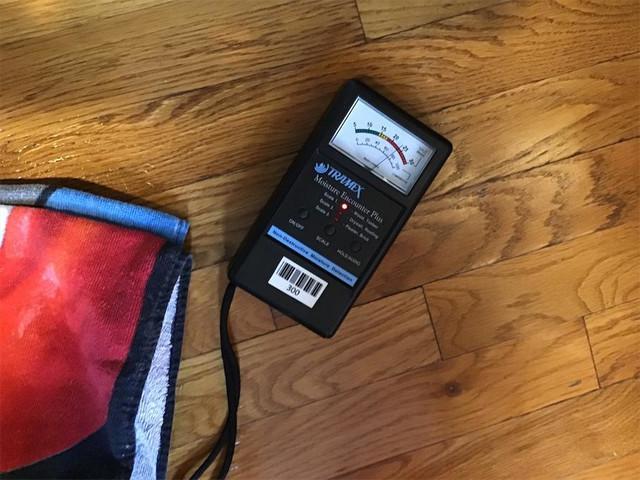 Kitchen moisture meter shows the floor was also damaged