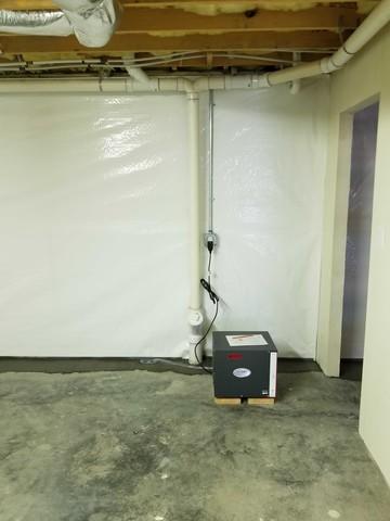 The final part of the system we installed into basement was a vapor barrier on the walls and SaniDry dehumidifier. These two products help keep moisture out of the air and filters the air inside the basement.