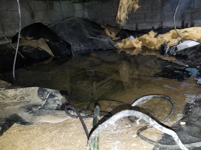 Flooded Sump Pump in Crawl Space