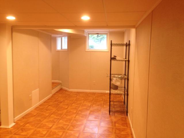 Many basements tend to be dark and depressing. These newly installed windows do a great job of making this a well lit and inviting space.  