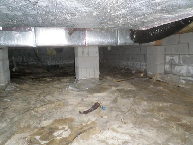 Millsboro, Delaware Crawlspace Encapsulation Repairs Moisture Trouble with Duct Work