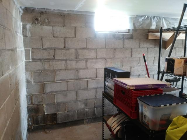 Before Photo - Failing Foundation Walls