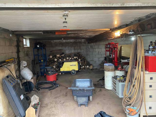 Partially Below-Grade Garage Suffers Foundation Damage