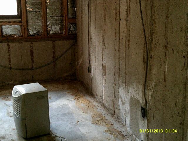 Floor and wall damage.