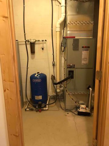 Housing the water filter and other appliances, this room experienced high humidity and was not particularly useful to the homeowner.