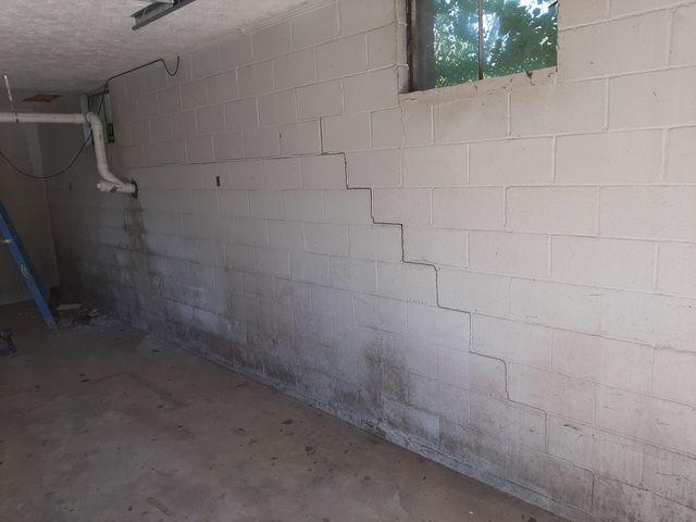 Cracks in the walls.