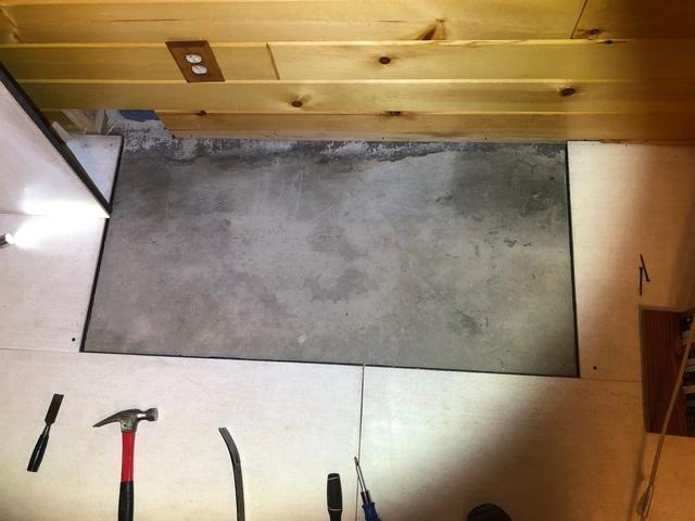 Tile Removed - Water Damage