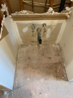 <p>After sink vanity, tiles and sheetrock were removed </p>