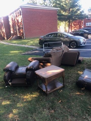 <p>Couch, chair and table left around the dumpster area by tenants. </p>