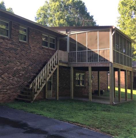 Concrete Patio Supporting Sunroom