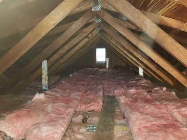 Here is an image of the entire attic space. You can see the rafter boards which is usually a clear indication that there is not enough insulation in the attic space.