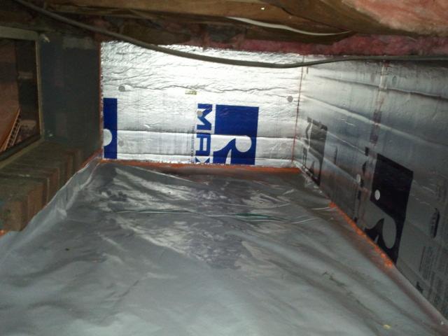 <p>The completed crawlspace, with a floor encapsulation and 2" foam board on the walls. This should correct the mold smell in addition to making the space above more comfortable.</p>